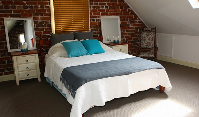 after-shot-styled-bedroom-bricked-wall-top-floor