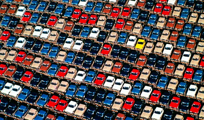 shot-from-above-car-plant-with-new-cars